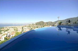 Infinity pool with view to Puerto Vallarta downtown and Zona Romantica